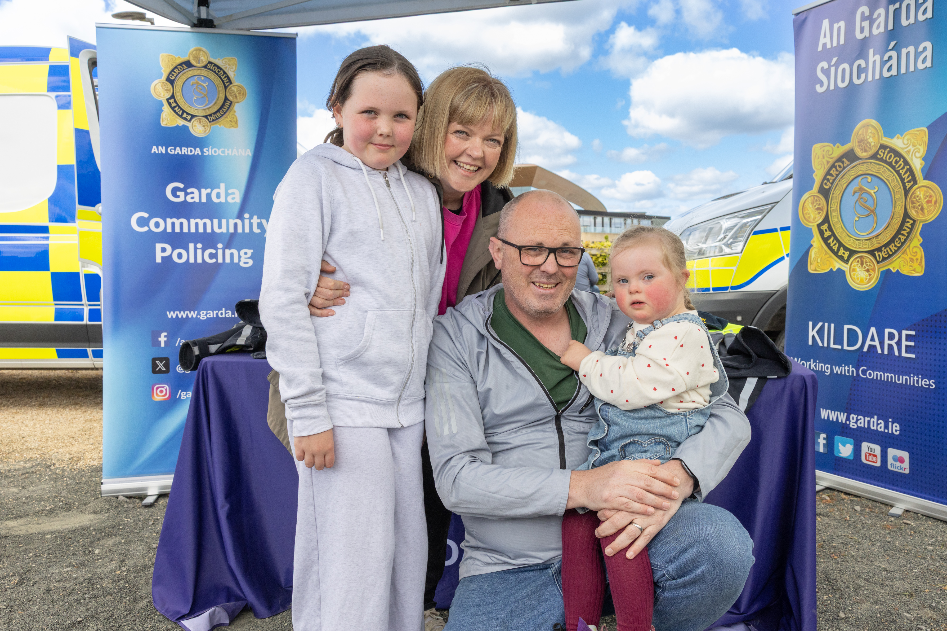 People at a Garda stall.